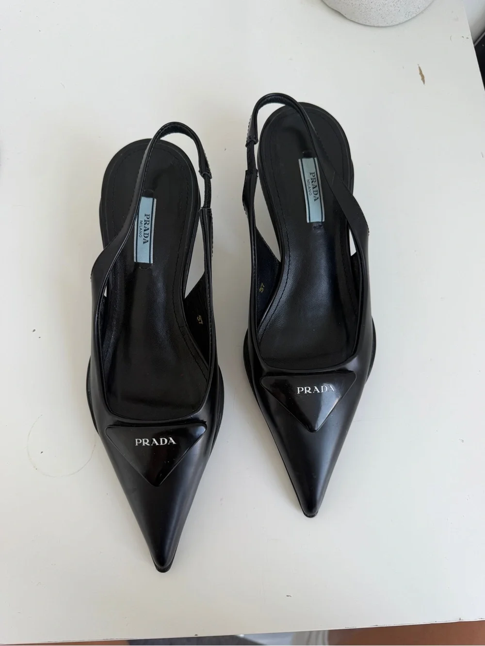 Prada Black Pointed Slingback Pumps with Logo Plaque